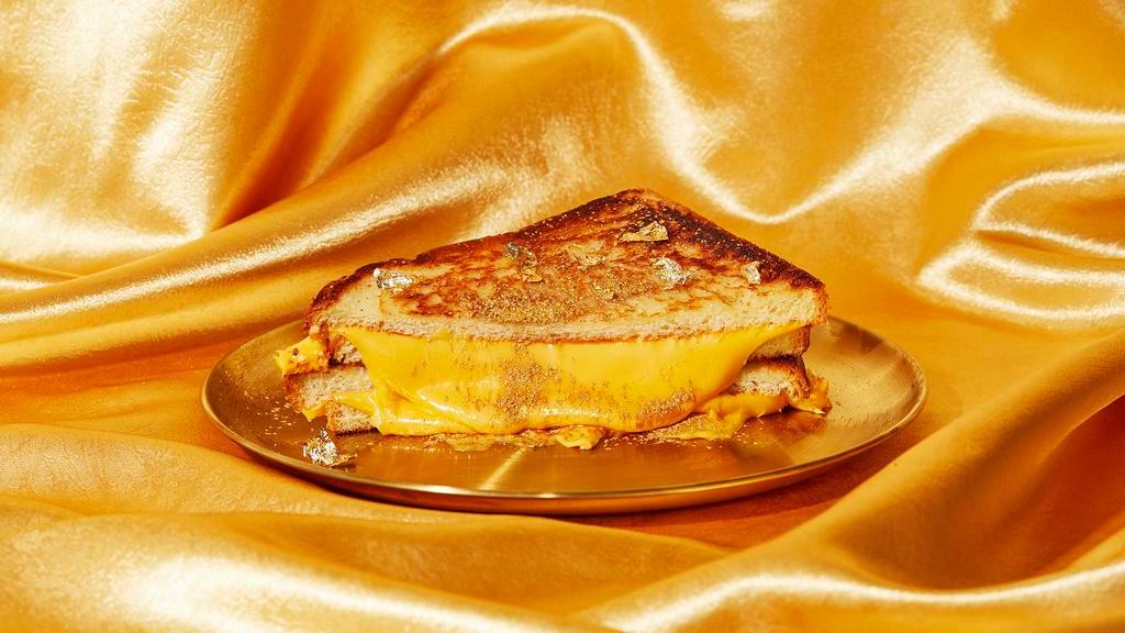 Classic & Classy Grilled Cheese · Our classic grilled cheese with melty gooey American cheese on griddled bread.