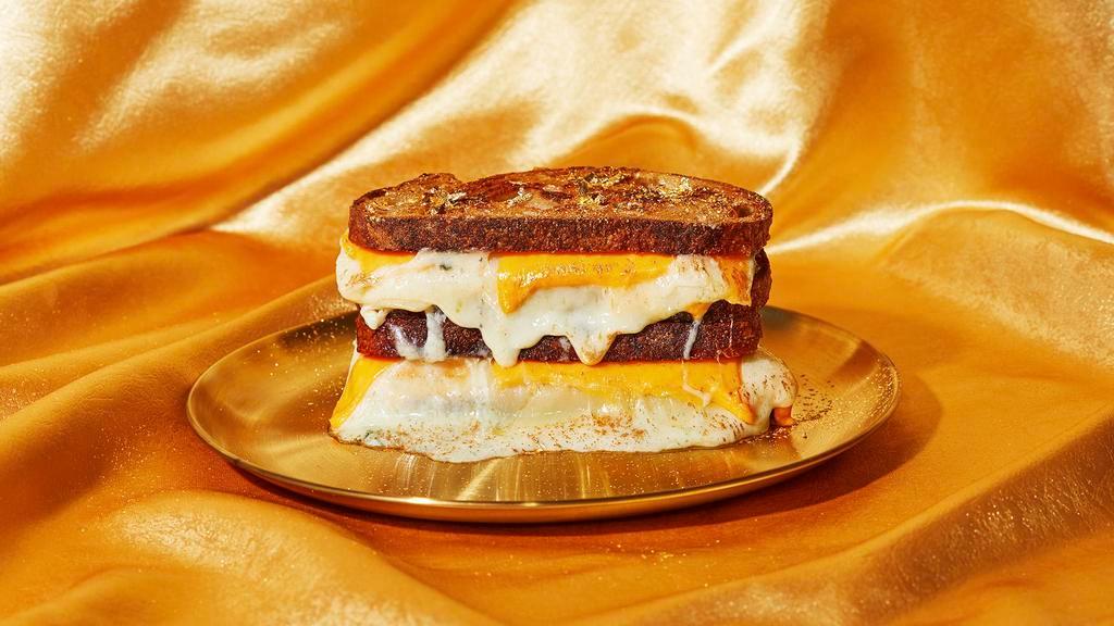 Lucky 7 Seven Cheese Grilled Cheese · Say cheese to this cheesy delicious grilled concoction of melty gooey cheddar, jack, mozzarella, fontina, gruyere, provolone, and blue cheese on griddled bread.