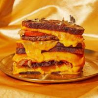 That's A Boujee Burger, Baby Grilled Cheese · Do a burger, but make it grilled cheese. Beef burger with melty gooey cheddar cheese, carame...