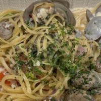 Linguine with Clams · Wild-caught Clams, Garlic, Lemon, Tomato, Leek, Fennel, Scallion, and Chardonnay Butter Sauce