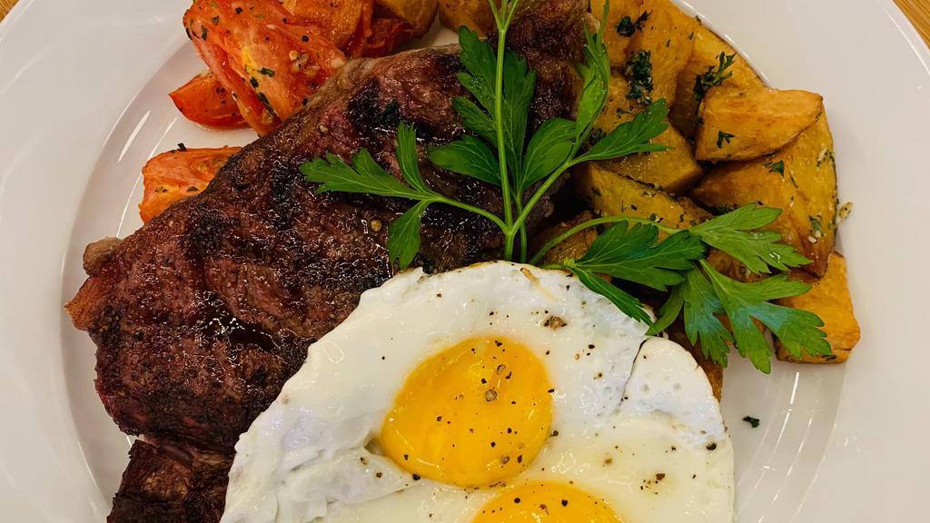 Steak & Eggs · Gluten free. 8 oz certified Black Angus New York Strip, grilled to your desire, served with two fried eggs, a tartine, and house potatoes or a cup of fruit.