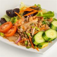 Yum-Siam · Spicy glass noodles tossed with ground chicken, prawns, red onions & spicy citrus vinaigrette