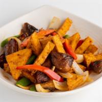 Pad-hed-ruam · Vegetarian. Sautéed tofu with shiitake mushrooms, eggplant & snow peas in a spicy garlic sa...