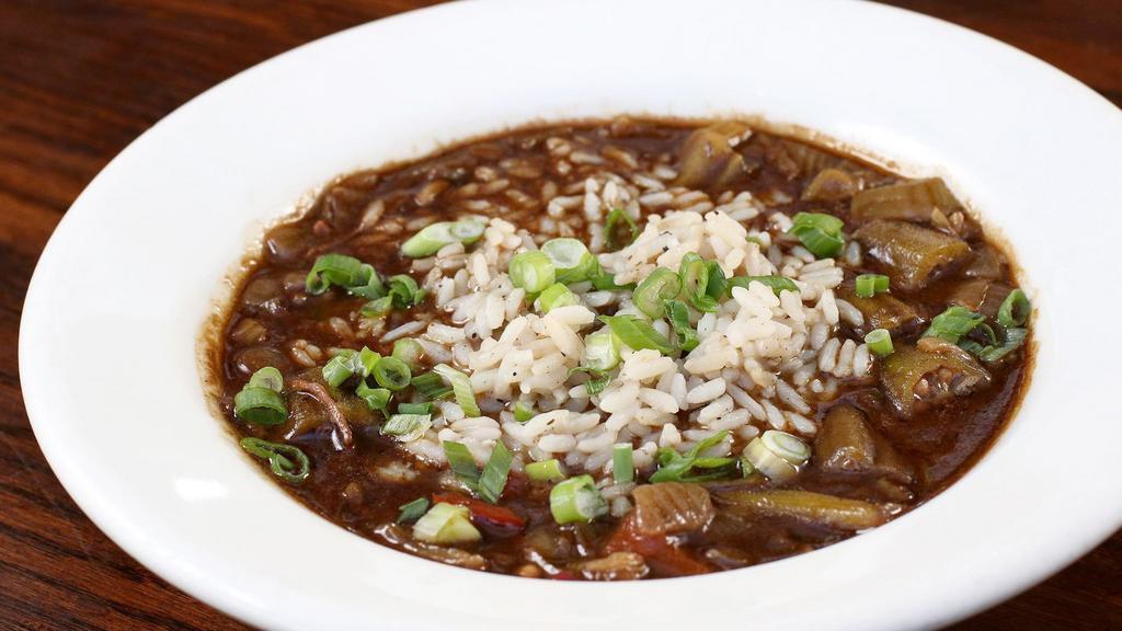 Gumbo  · Gumbo with chicken, andouille, stewed okra, and rice