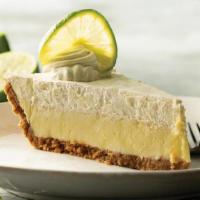 Key Lime Pie · Tart Florida key lime pie with graham cracker crust and whipped cream. .