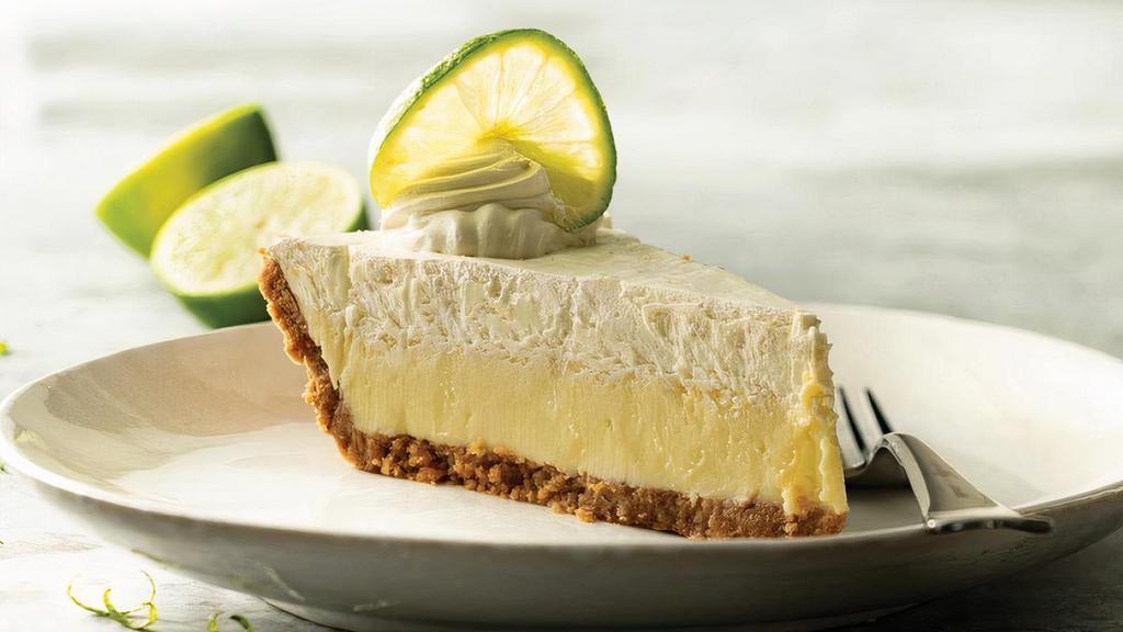 Key Lime Pie · Tart Florida key lime pie with graham cracker crust and whipped cream. .