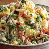 Potato Salad · Potatoes, carrots, onion, mayonnaise and fresh parsley.