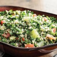 Quinoa Tabbouleh · Quinoa, fresh parsley, green onions, Roma Tomatoes, diced cucumbers with fresh lime juice..