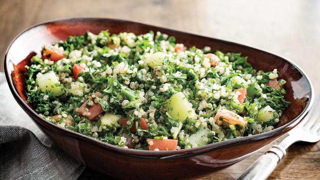 Quinoa Tabbouleh · Quinoa, fresh parsley, green onions, Roma Tomatoes, diced cucumbers with fresh lime juice..