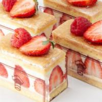 Rouge (Strawberry Cake) · Almond génoise, vanilla mousseline cream, fresh strawberries & light Italian meringue.
