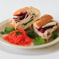 Roast Turkey Breast Sandwich · With cranberry sauce and French Brie cheese.