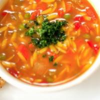 Soup of the Day · Hot and hearty vegetable soup. Served with sliced baguette.