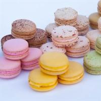 Large French Macaron · Almond based egg white cookies, assorted traditional flavors include pistachio, raspberry, m...