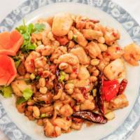 Kung Pao Three Delights · Hot and spicy. Prawns, scallops and chicken in a spicy sauce with peanuts and scallions.