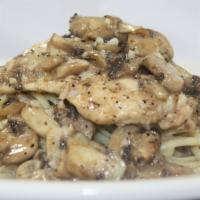 Chicken Marsala · Chicken breast sauteed with mushrooms in a sweet sicilian marsala sauce over linguine.