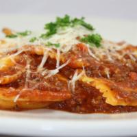 Ravioli Bolognese · Home made meat sauce tossed w/ cheese ravioli.