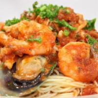 Frutti Di Mare · Fresh calamari, Shrimp, mussels, clams, garlic, tomato sauce w/ angel hair pasta.