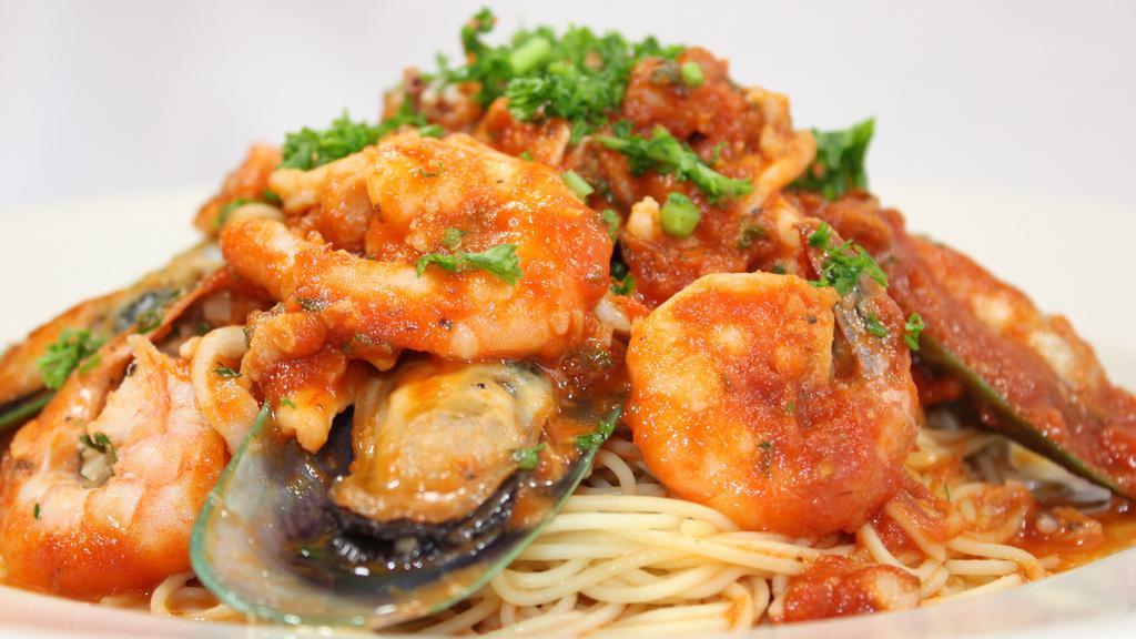 Frutti Di Mare · Fresh calamari, Shrimp, mussels, clams, garlic, tomato sauce w/ angel hair pasta.