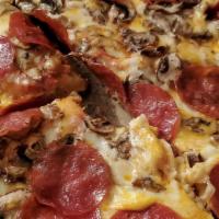 Milano pizza · Pepperoni, mushroom, mozzarella & cheddar cheese with tomato sauce.