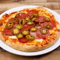 Amante Della Carne pizza · Ham, Salami, Italian sausage, Bacon, Jalapeno,  Cheese and Tomato  sauce.