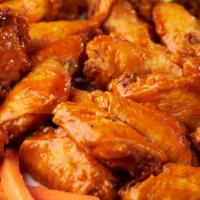 30 Wings Pack · Your Choice of 30 UD'S Way or Boneless Wings with Up to 3 Flavors, Large Fries or Veggie Sti...