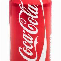 Canned Coke (12 oz) · Ice cold, refreshing canned Coke!