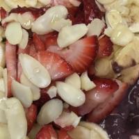 Vitality Bowl · Base blend: organic acai, VB blend, bananas, strawberries and flax seed. Toppings: organic g...