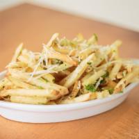 Parmesan Garlic French Fries · Crisp french fries tossed in Gilroy garlic-parsley butter, finished with fresh grated parmes...