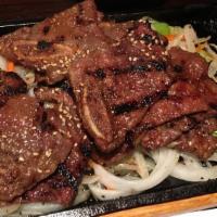 Beef Teriyaki · USDA prime rib with sautéed vegetables.