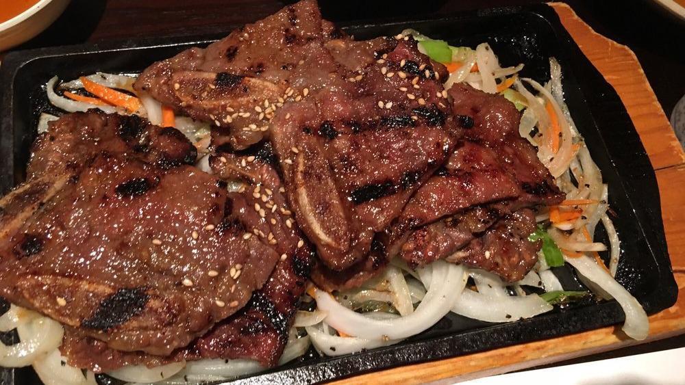 Beef Teriyaki · USDA prime rib with sautéed vegetables.
