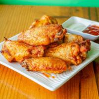 Spicy Wings · Chicken wings marinated in hot spicy sauce.