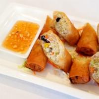 Thai Egg Roll · Deep-fried eggroll wrap stuffed with silver noodles, cabbage, carrot, taro, yellow onion mus...