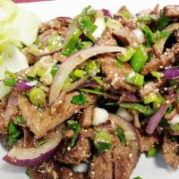 Num Tok · Grilled homemade Thai e-san herbal marinated trender sliced beef mixed with cilantro mint, r...