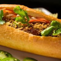Bánh Mì, Chips & Drink · grilled lemongrass pork, chicken or tofu. Soda, unsweetened iced tea, or Thai iced tea. Sand...