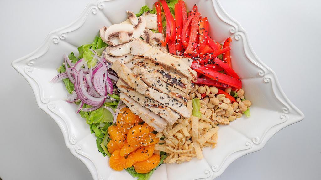 Mandarin Chicken Breast Salad · Mixed Greens, Chicken Breast, Red Onion, Red Bell Pepper,  Mushrooms, Mandarin Oranges, Peanuts, Crispy Noodles Topped With Sesame Seeds and Tossed in Homemade Sesame Dressing. Served with French Bread