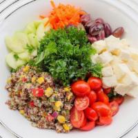 Lemon Garlic Kale & Quinoa Salad · Organic Kale, Homemade Savory Quinoa, Feta Cheese, Kalamata Olives, Cucumbers, Tomatoes, Shr...