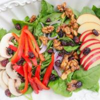 Baby Spinach Salad (Seasonal) · Baby Spinach, Mushrooms, Red Bell Pepper, Red Onion, Candied Walnuts, Dried Cranberries, & A...