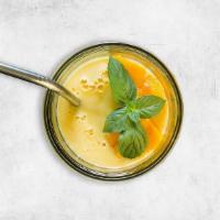 Churned Mango Yogurt Smoothie · A thick smoothie made with fresh churned mango flavored yogurt beverage