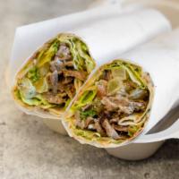 Beef Shawarma Wrap · Tri-tip shawarma, romaine, cabbage, onion, tomato, pickles, herbs, tahina sauce, sweet haris...