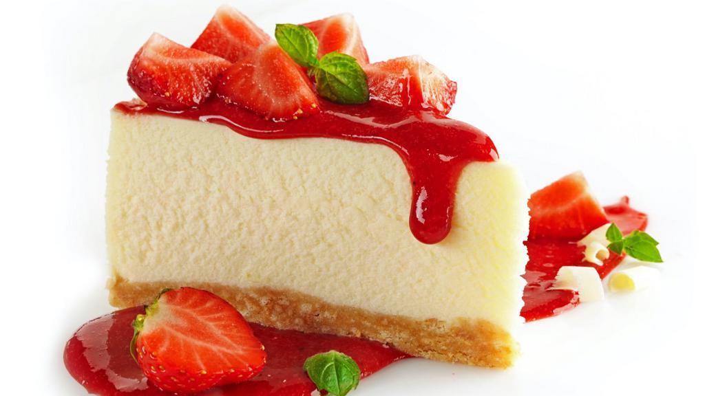 Strawberry Cheesecake · A rich and creamy New York-style cheesecake with strawberries baked inside a honey-graham crust.