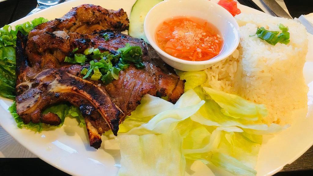 Cơm Sườn Nướng · BBQ pork chop rice plate