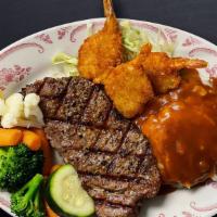 Steak & Prawns · Steak & Prawns
10 oz New York steak charred to your preference with deep fried prawns. Serve...