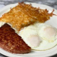 Corned Beef Hash & Eggs · Old fashioned corned beef hash, Two eggs, hash browns, toast or pancakes
