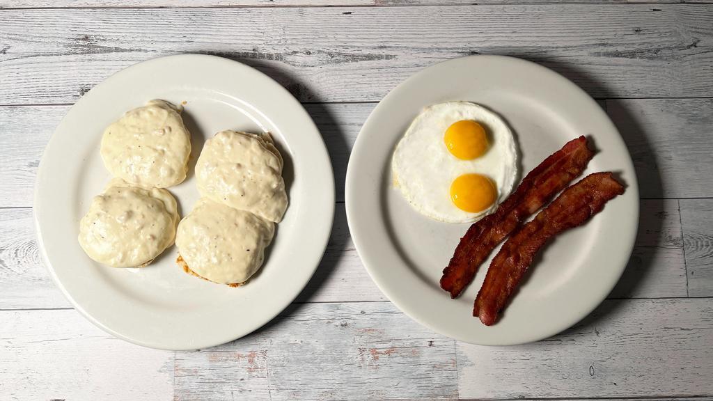 Biscuits & Gravy Deluxe · Biscuits, country gravy, two strips bacon or sausage, two eggs.