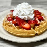Fresh Strawberry Waffle · Strawberries, powdered sugar, whipped cream.
