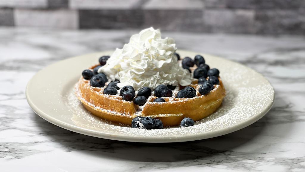 Fresh Blueberry Waffle · Blueberries, powdered sugar.