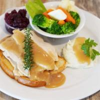 Hot Turkey · Open faced sourdough, mashed potatoes, fresh vegetables.