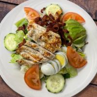 Cobb Salad · Chicken breast, bacon, avocado, tomatoes, cucumbers, hard-boiled egg, bleu cheese crumbles