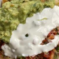 Super Nachos · Served with choice of meat, refried beans, cheese, salsa, sour cream, and guacamole.