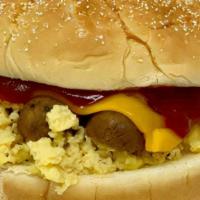 Sausage Breakfast Sandwich · Plant-based maple sausage. scrambled eggs and melted cheese on a vegan bun with classic ketc...